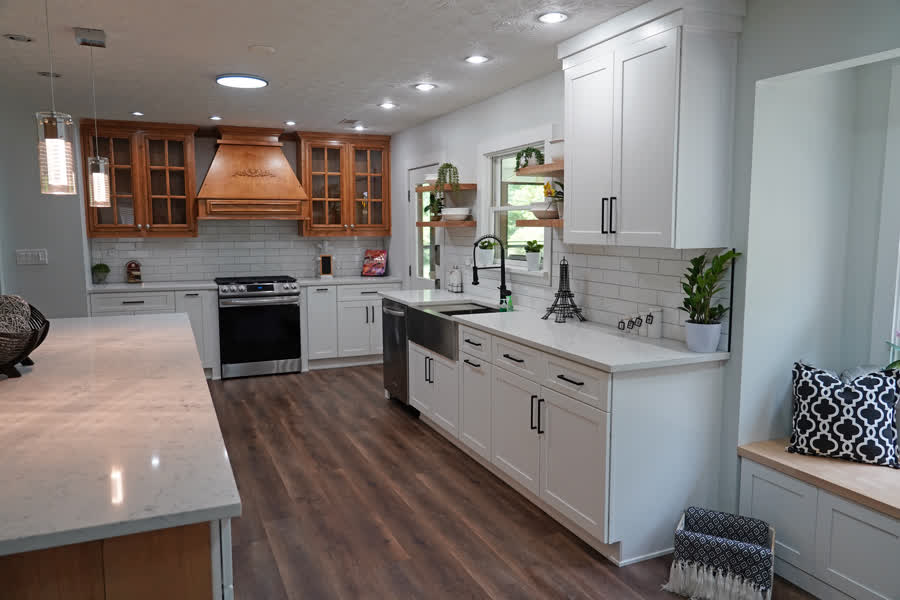 Summit Building more of the kitchen backsplash with view of custom fume hood