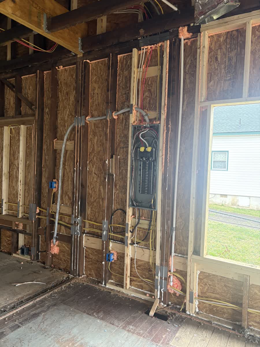 Summit Building unfinihsed interior with electrical panel